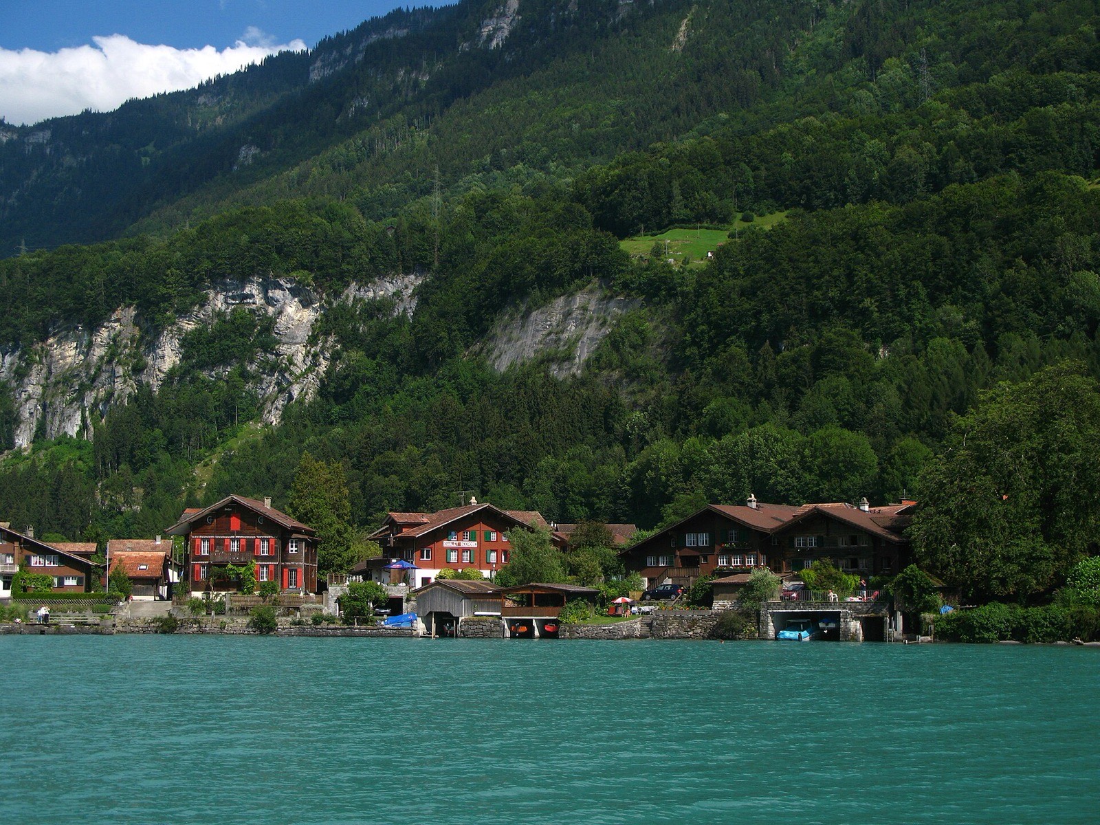 Iseltwald jetty on the turquoise water of Lake Brienz